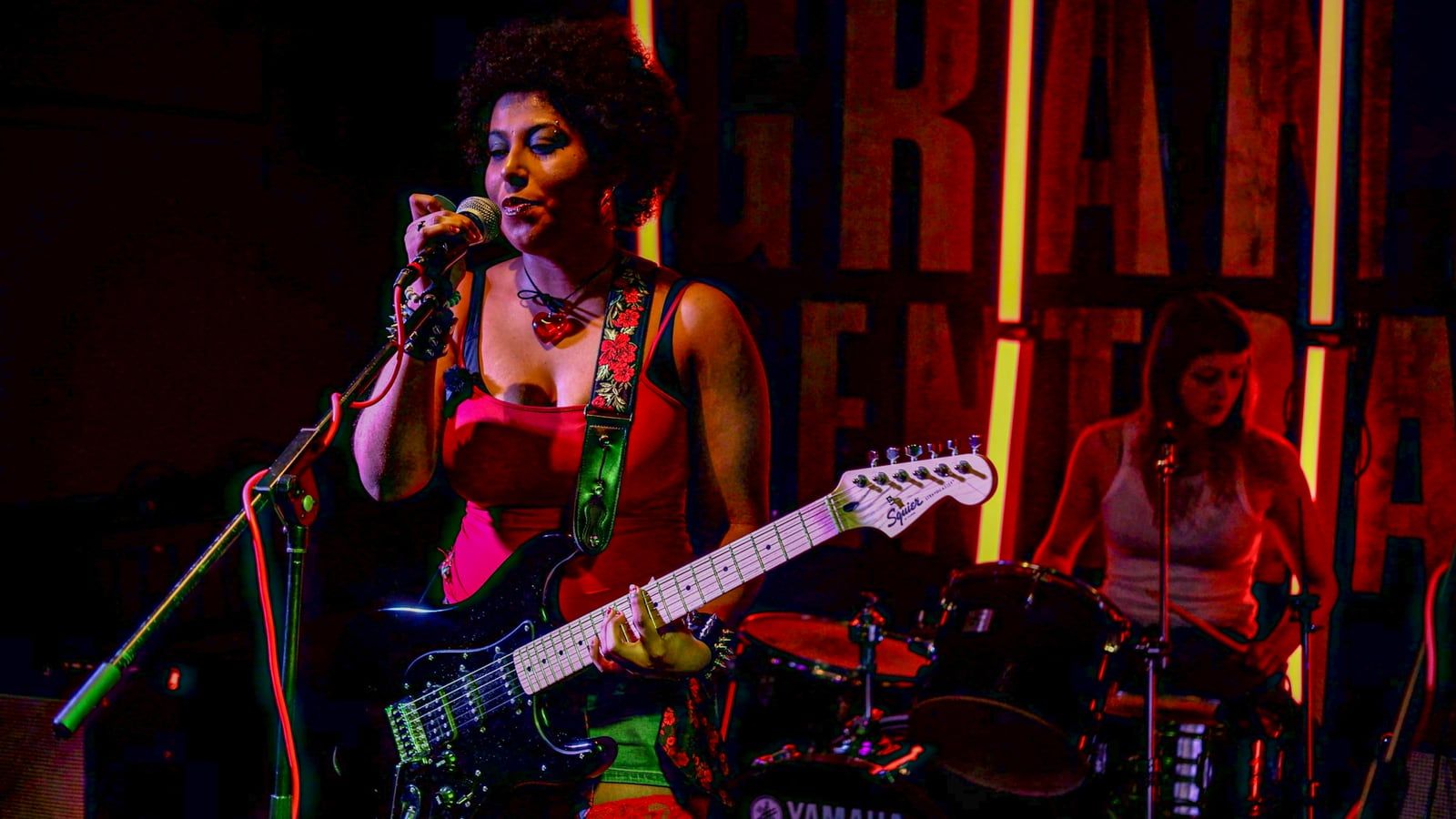 Fronting the band, live
